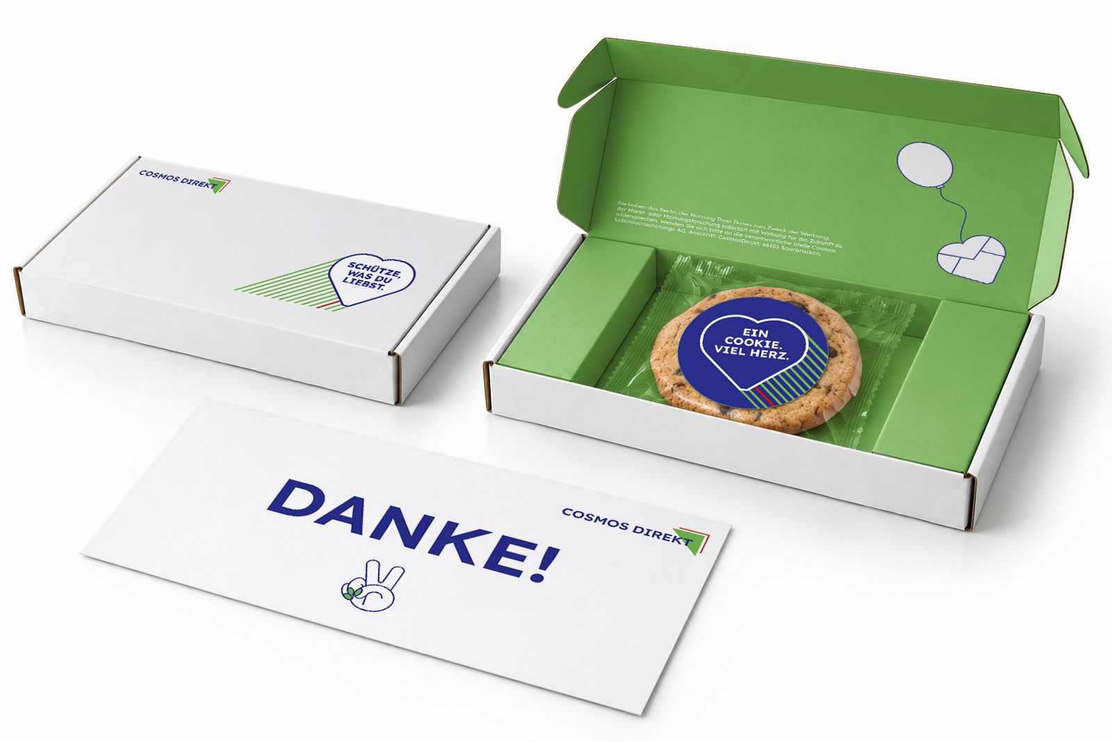 Box, Cookie mit Aufkleber „Ein Cookie. Viel Herz.“ und Dankeskarte